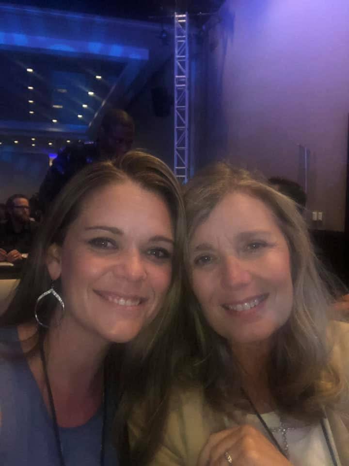 Mother and daughter at an industry event